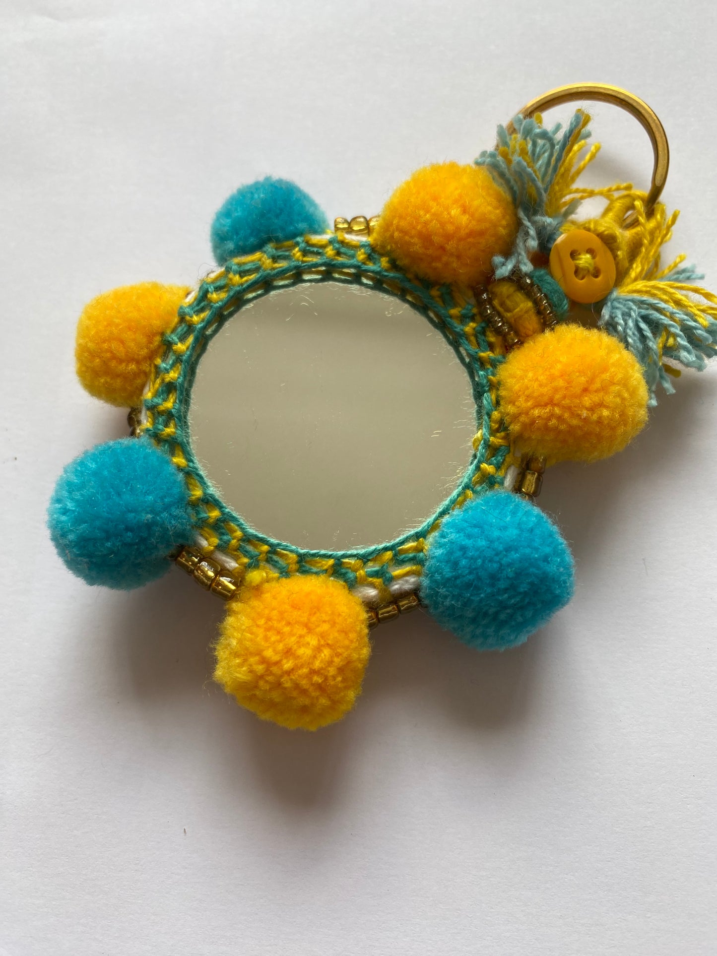 Pompom Mirror in Blue and Yellow