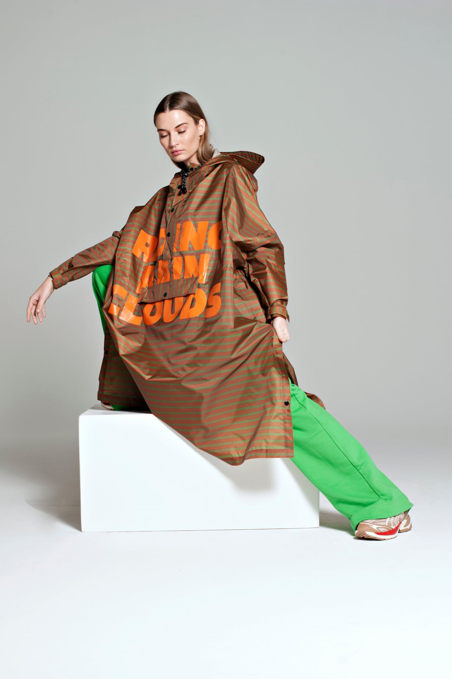 Breton Brown Green Text - Rain Poncho Brown